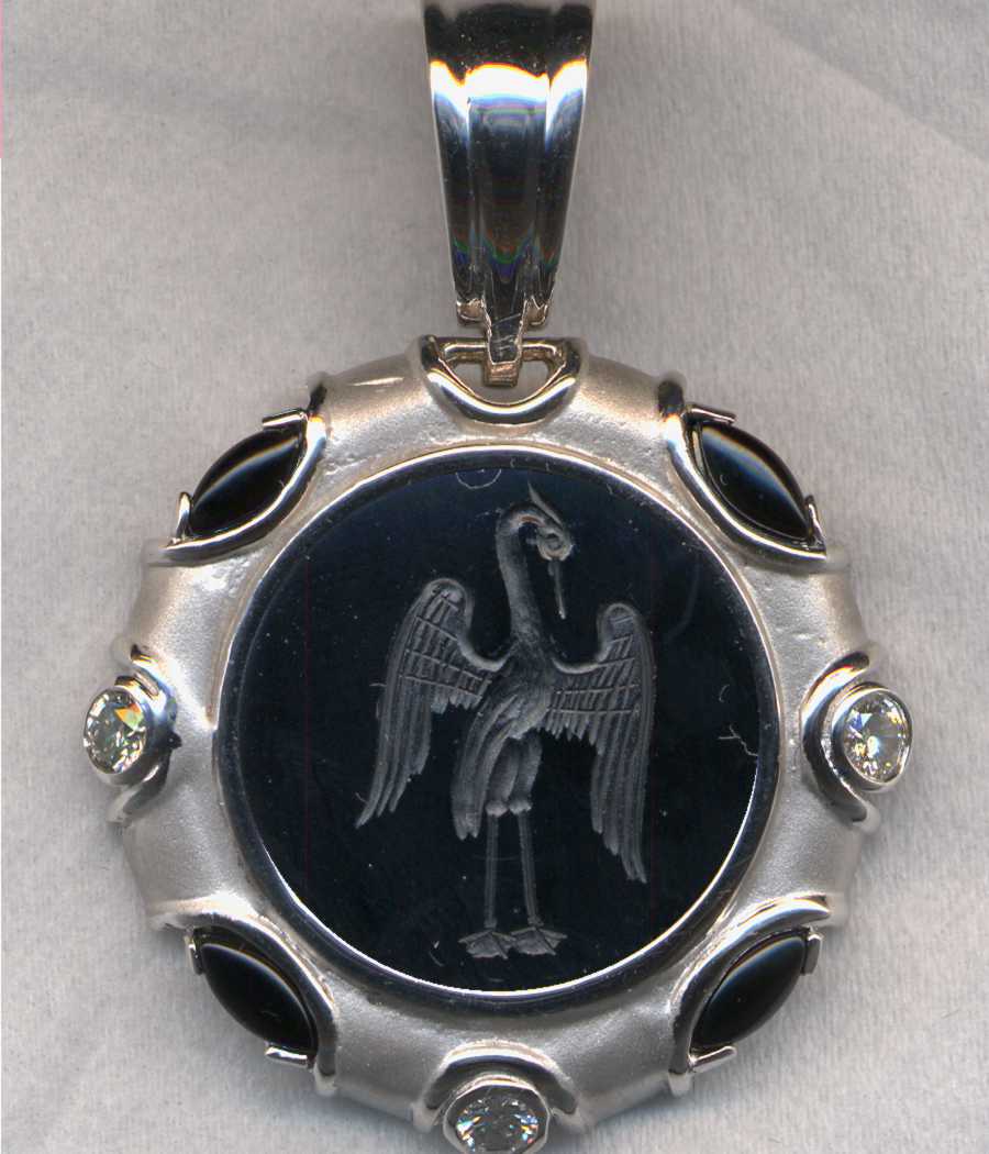A Mythological Pendant in Black Onyx and white gold.