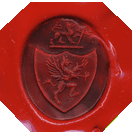 Wax inpression of the a man's gold Family Crest Ring.